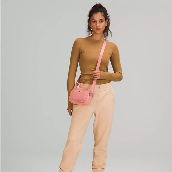 lululemon athletica Handbags - NWT Lululemon double-zippered crossbody in pink savannah
